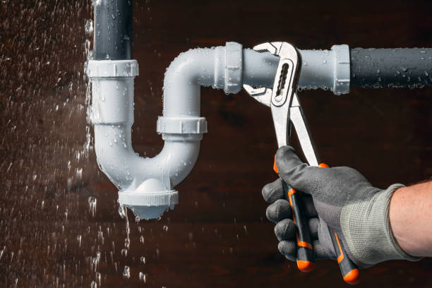 Professional Drain Cleaning technician working in Colfax, IA